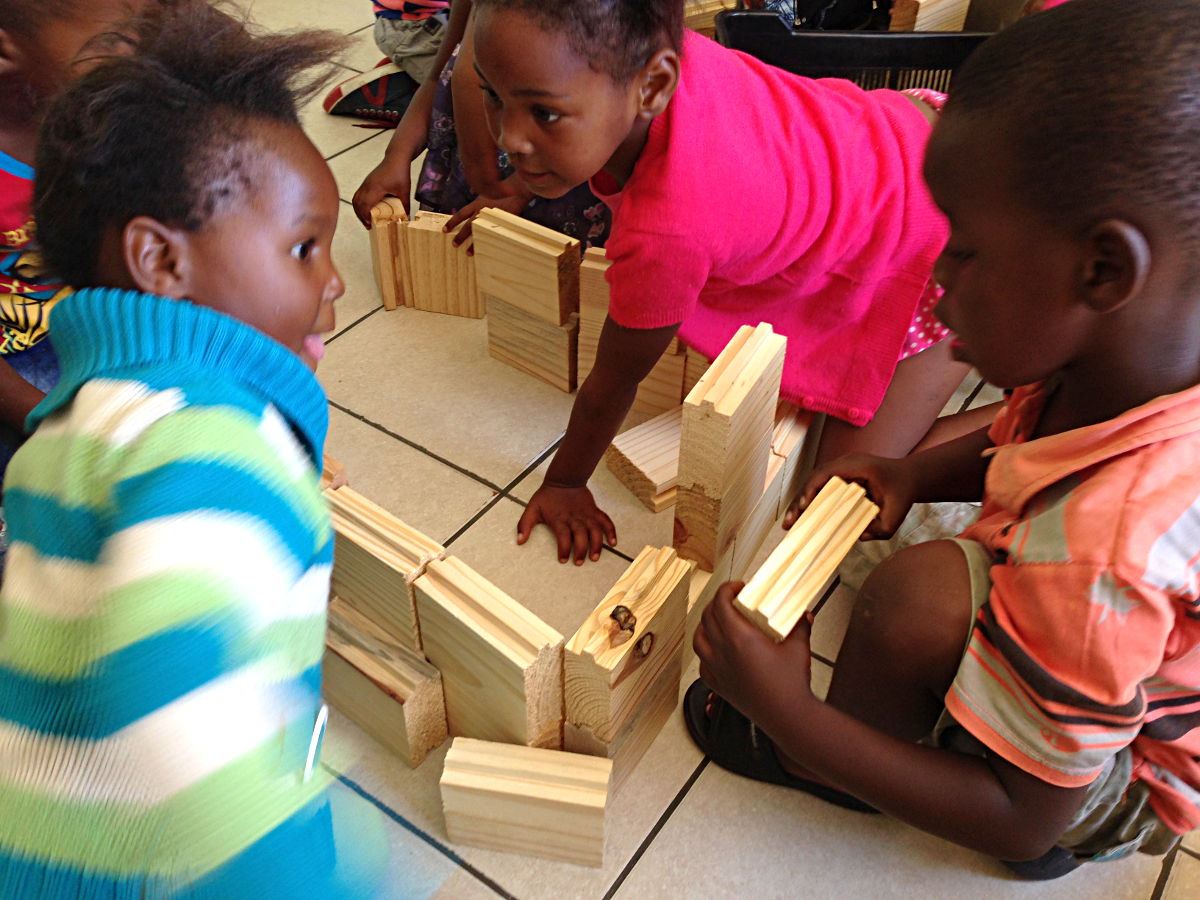 playing with wooden blocks